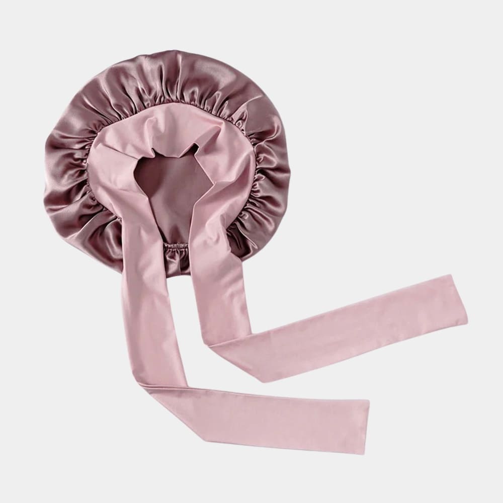 Bonnet de nuit en soie rose avec nœud
